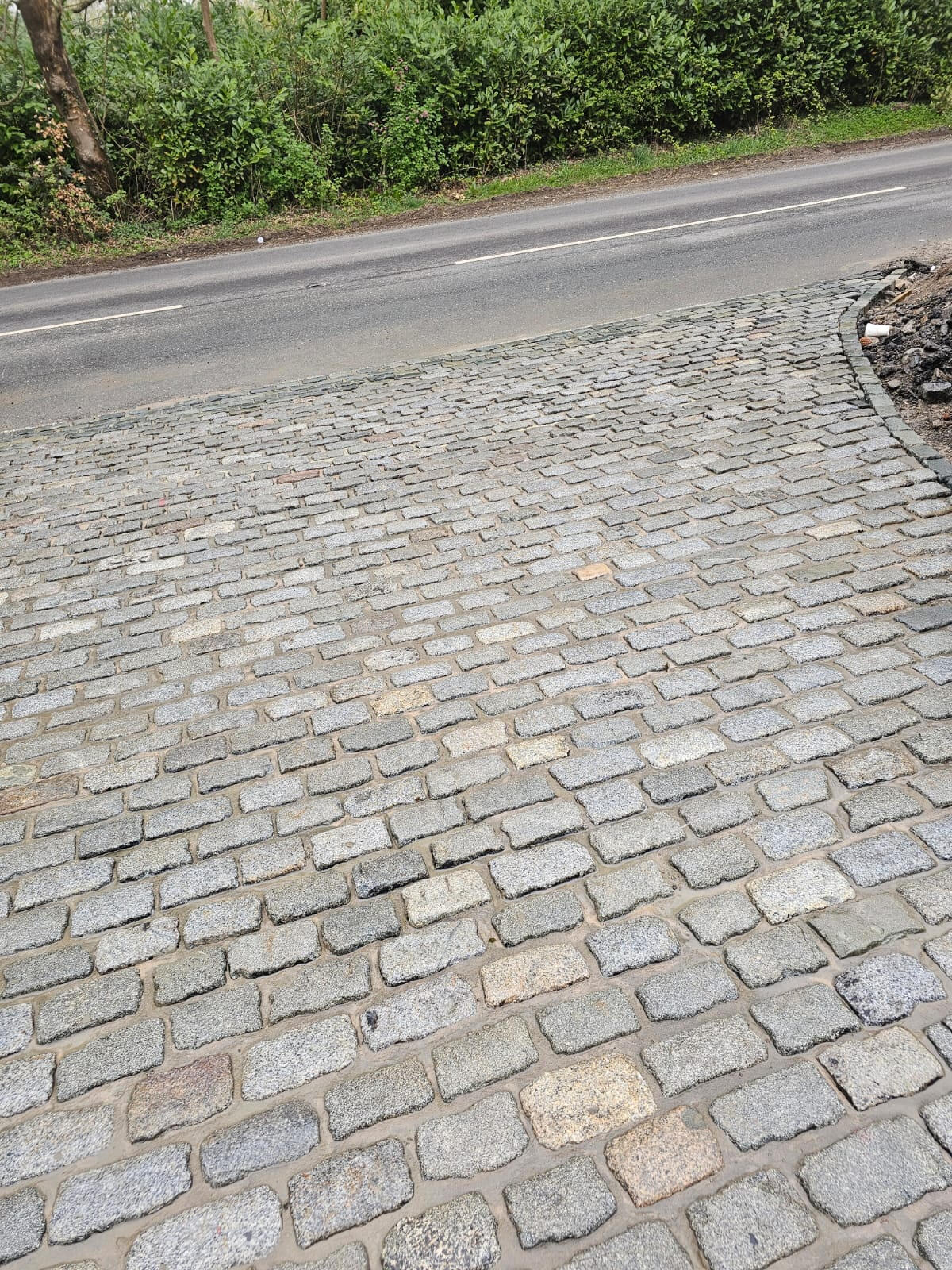 Granite setts cobbled driveway entrance off a country road