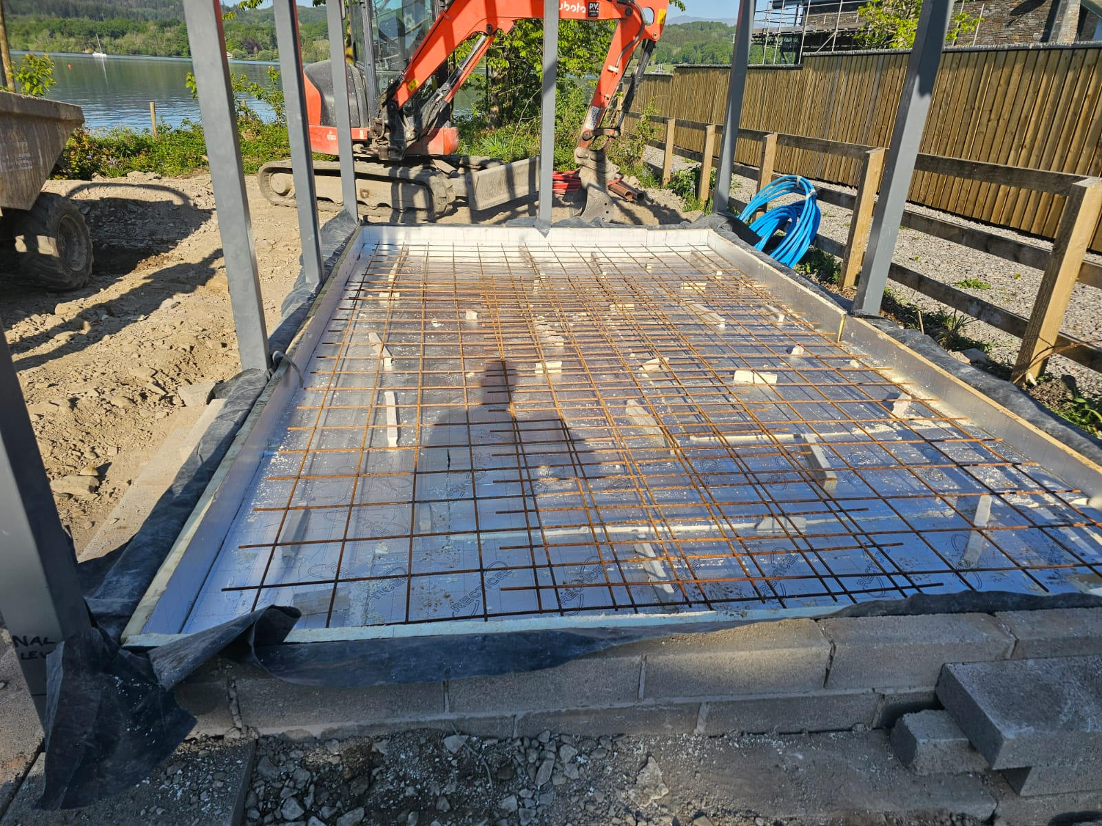 Insulation boards, DPM and rebar mesh laid inside formwork ready for the concrete pour